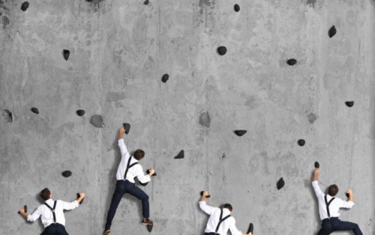 Business concept, a group of employees climbs up