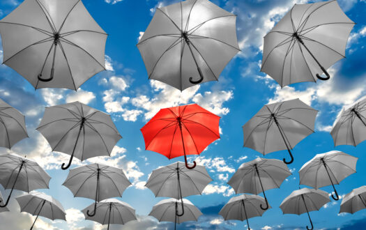umbrella standing out from the crowd unique concept mental health