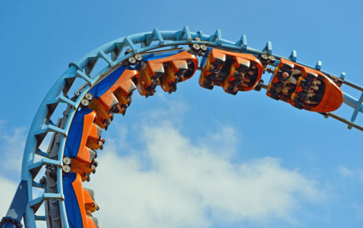 Roller coaster looping upside down